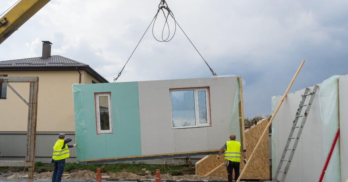 Prefab Home - Panel being lifted by crane