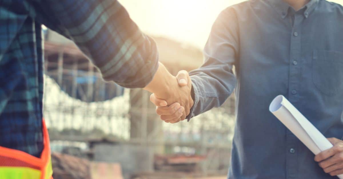 Builders Shaking Hands