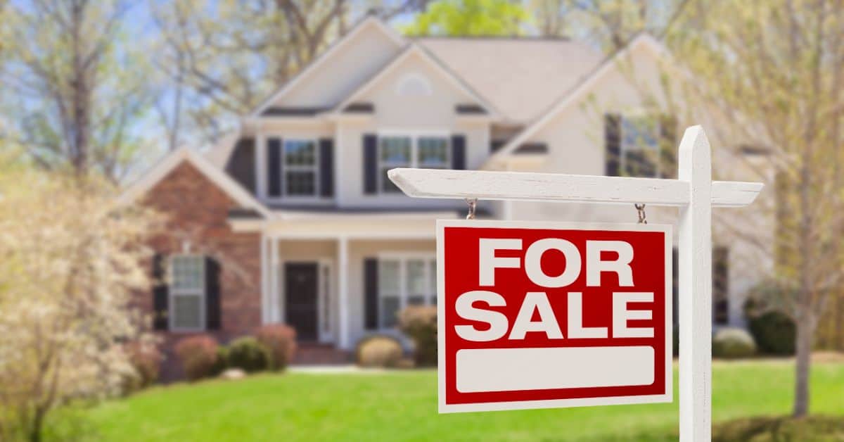 Home Construction - for sale sign infront of house