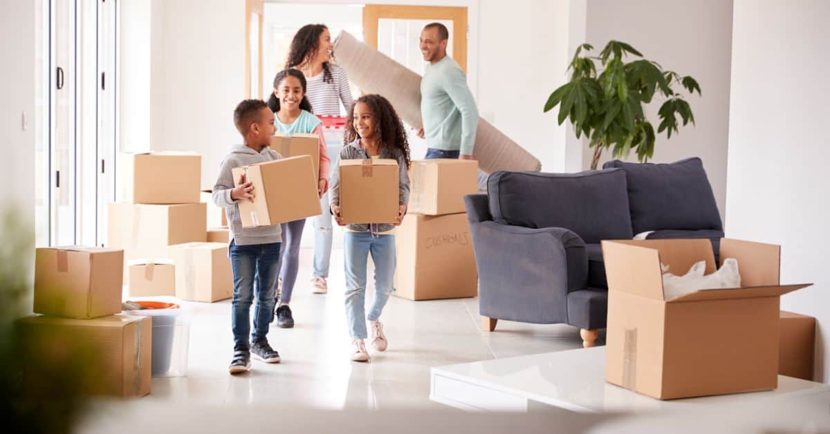 Happy Family moving into their new home