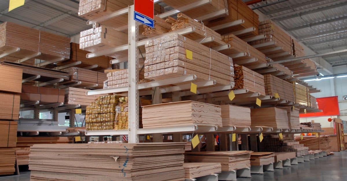 Building materials stored in a warehouse for affordable house construction in South Africa.