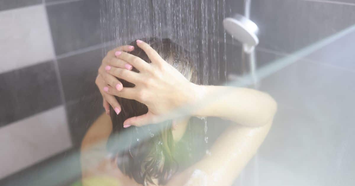 Lady having a hot shower
