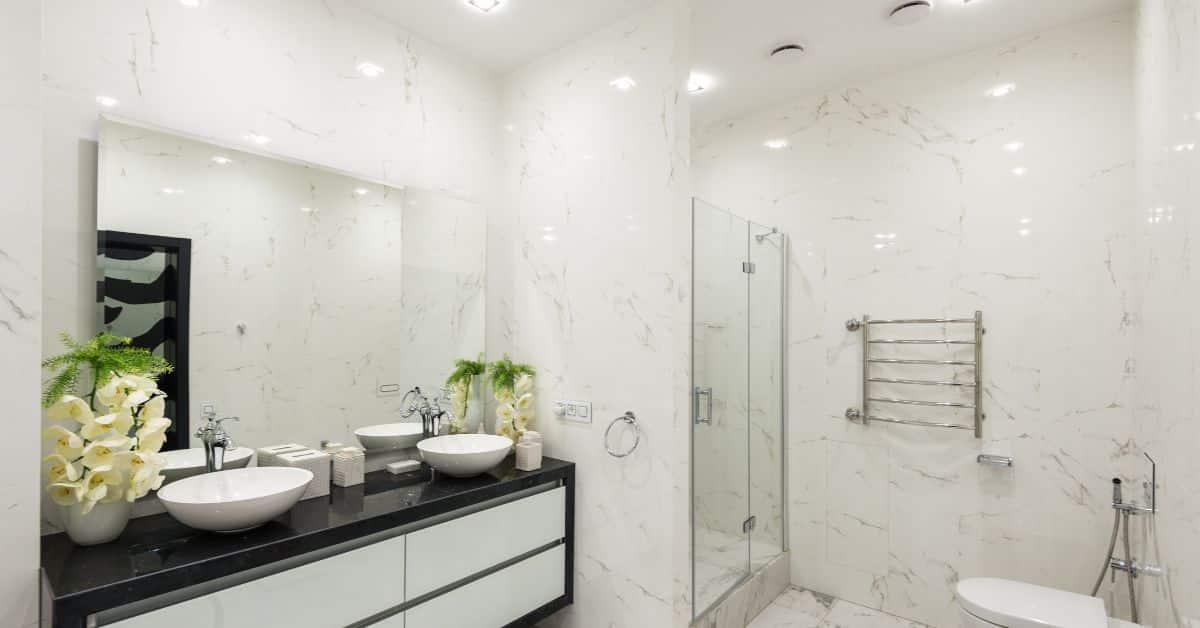 Modern bathroom shower with glass enclosure and sleek fixtures for a luxurious experience.