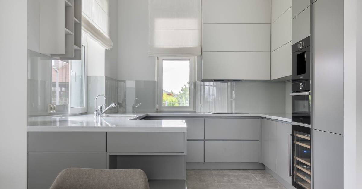 A clean, grey minimalist kitchen
