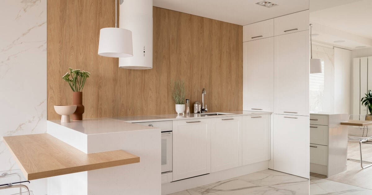 Modern kitchen with updated cupboards and minimalist design.