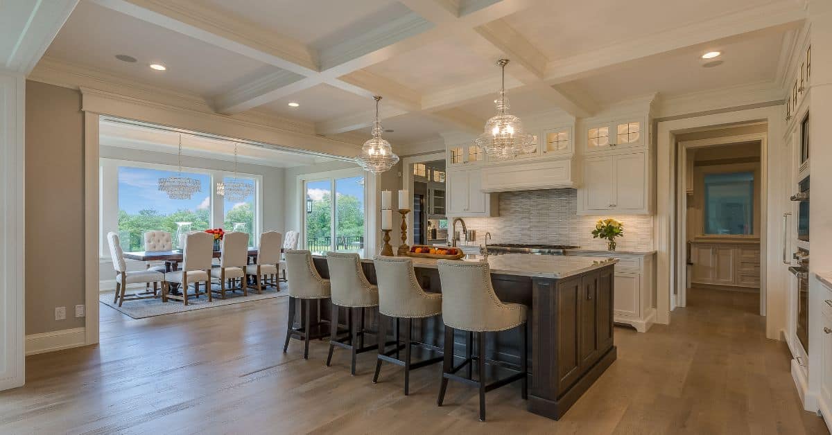 Spacious open plan kitchen and lounge with modern design and ample natural light.