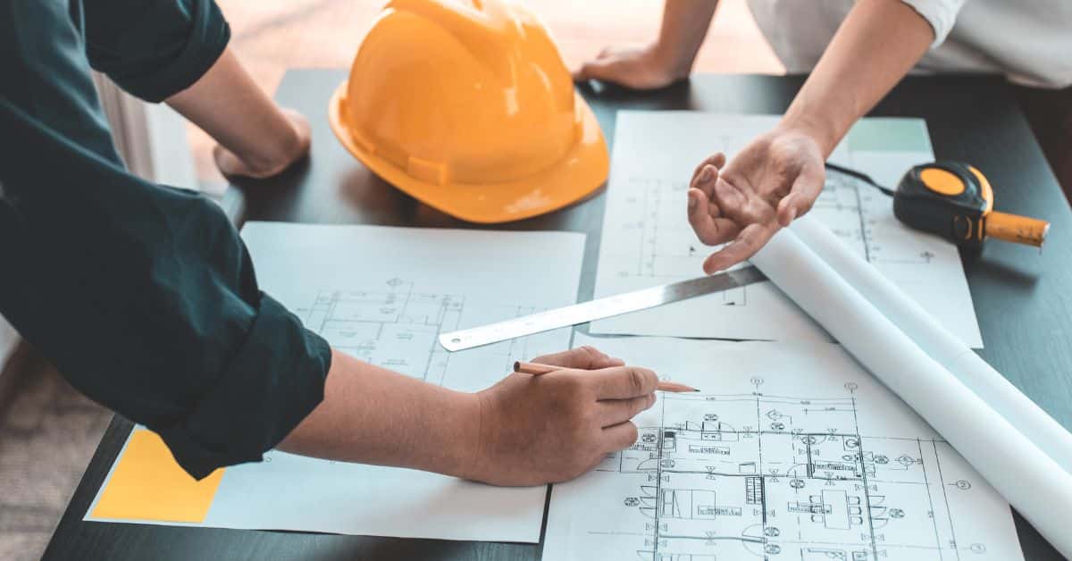 Custom home builders looking at the architect designs