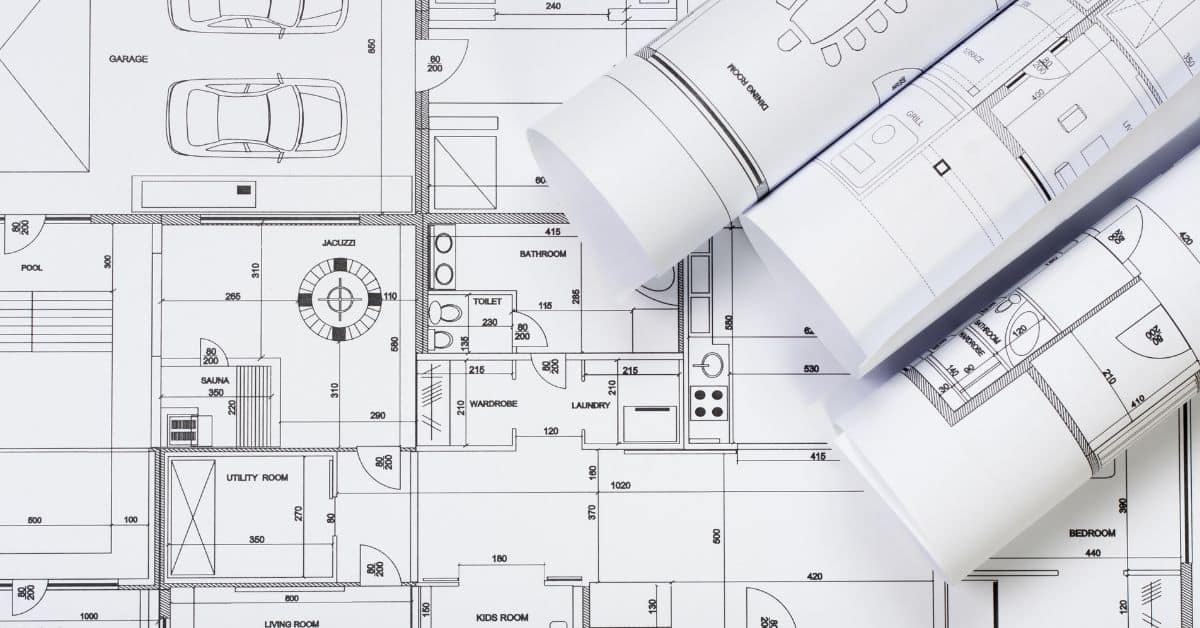 Blueprint of a detailed house plan with architectural layouts and room arrangements.