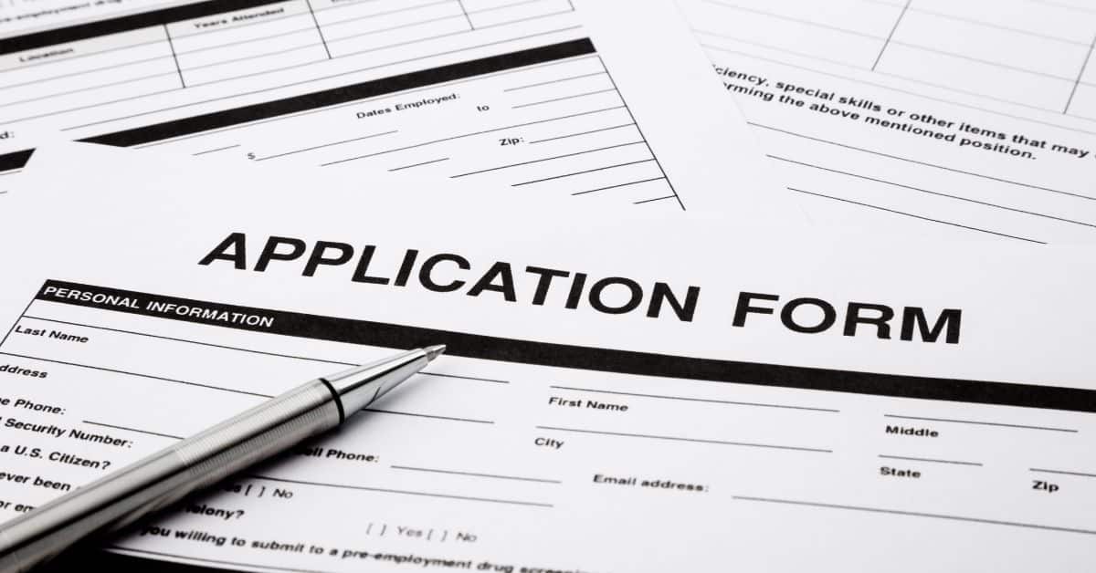 Application Form with a pen on it