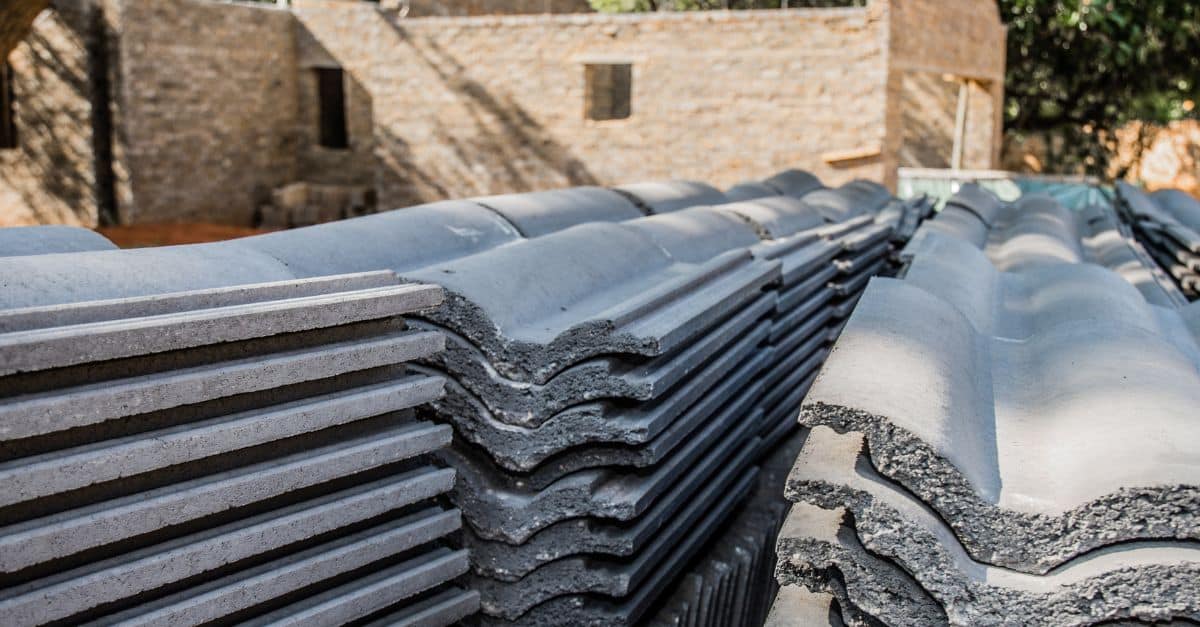 Stacked roofing tiles ready for installation in Cape Town construction projects.