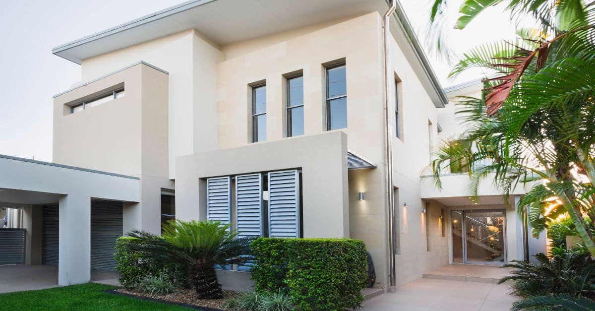 Elegant contemporary house showcasing modern architecture and lush greenery.