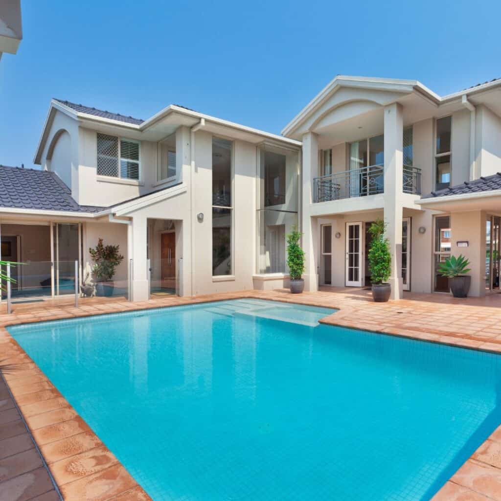 Luxury home with private pool in Constantia, showcasing modern architecture and outdoor living space.